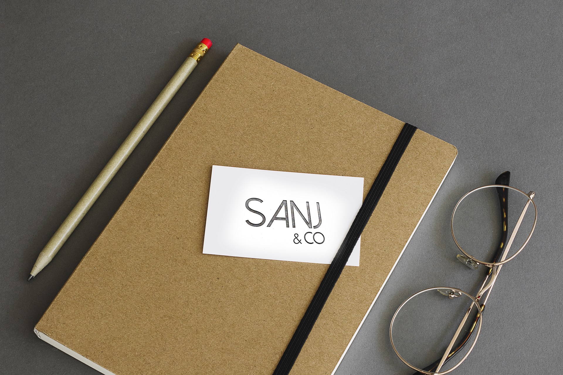 stationery-concept-with-business-card-book_logo